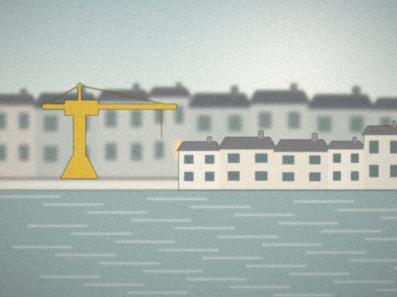 Quais de Nantes au bord de la Loire avec la silhouette d'une grue portuaire jaune